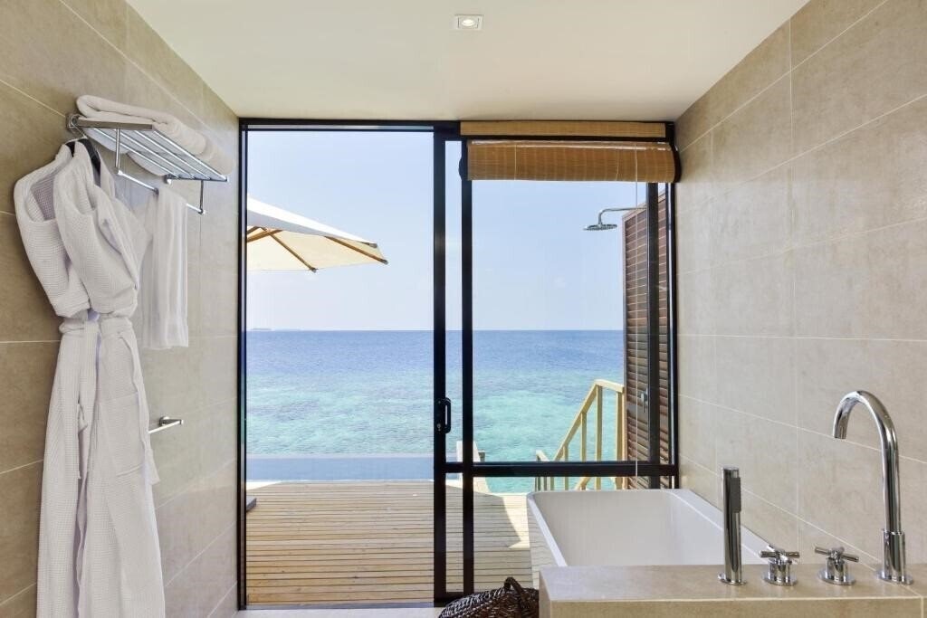 Фотография Robinson Maldives 4*