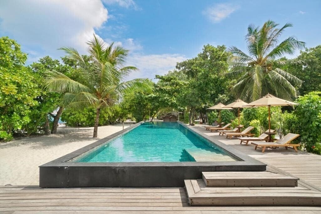Фото The Barefoot Eco Hotel (Guest House) Guest House 3*