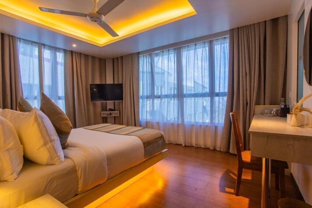 Фото Coconut Tree Hulhuvilla Beach 4*