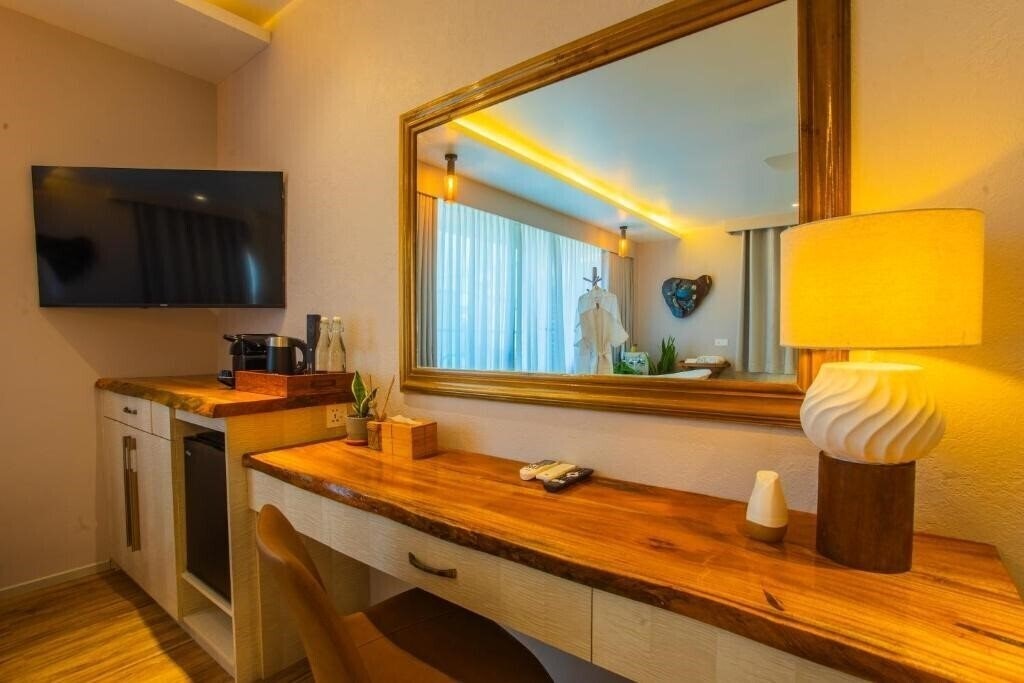 Фотография Coconut Tree Hulhuvilla Beach 4*