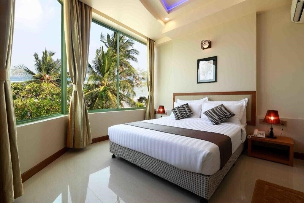 Отель Season Holidays Hulhumale Guest House гостиный двор