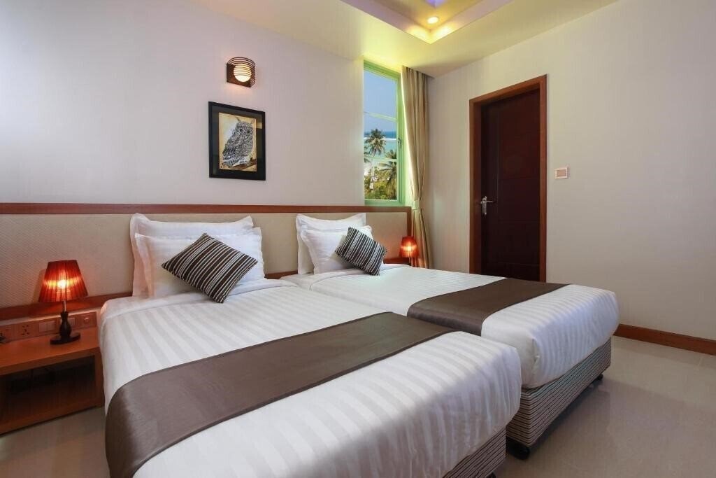 Фото Season Holidays Hulhumale Guest House гостиный двор