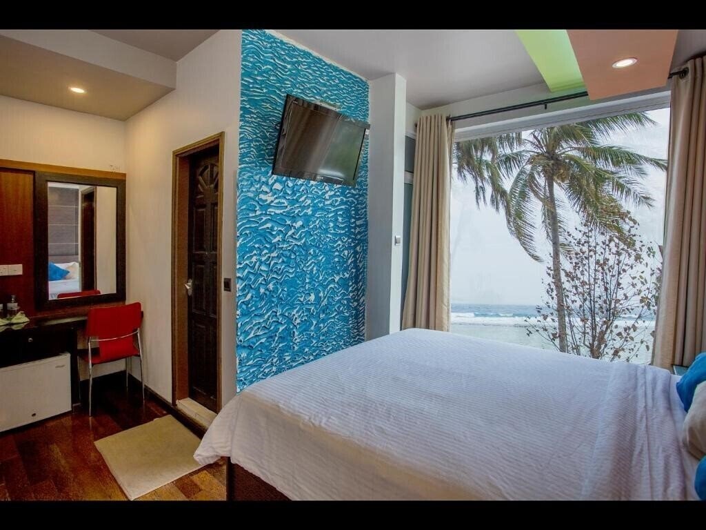 Изображение Ripple Beach Inn Guest House гостиный двор