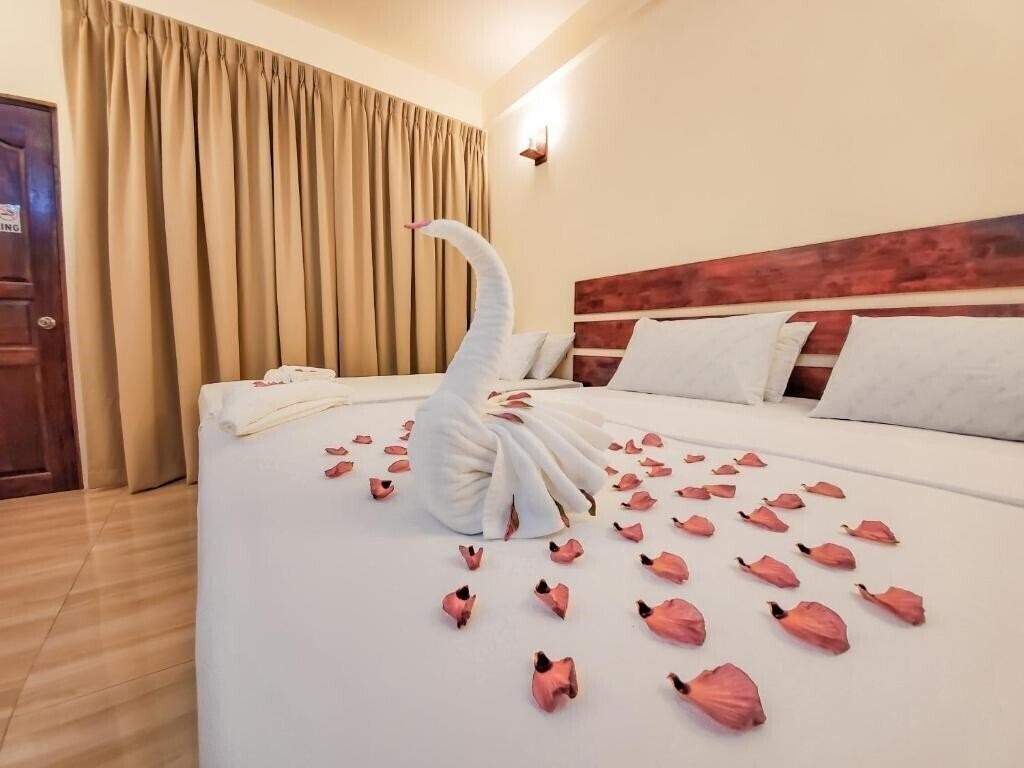 Фотография Shoreline Grand Thoddoo Guest House гостиный двор