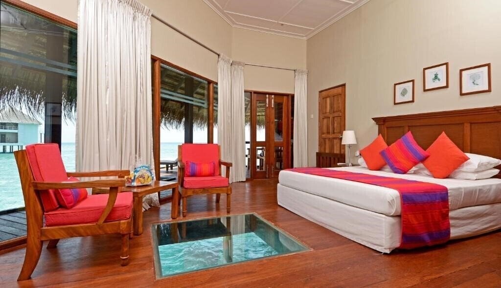 Фото Adaaran Club Rannalhi 4*