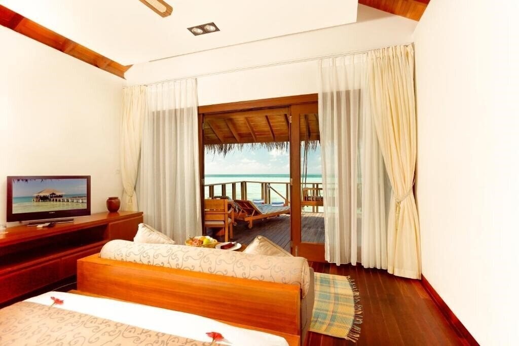 Фото Medhufushi Island Resort 4*