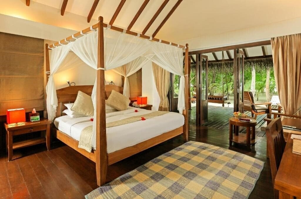 Фотографія Medhufushi Island Resort 4*