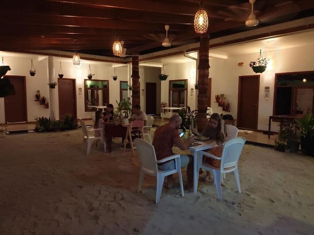 Фотографія Summer Sky Thoddoo Guest House гостиный двор