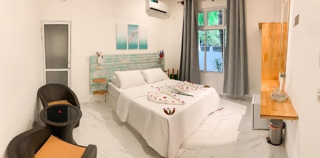 Фотография Fins Dive And Leisure Hotel Guest House гостиный двор