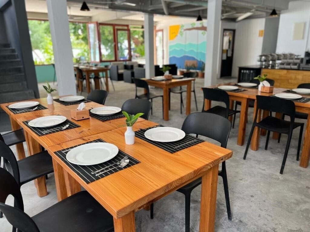 Фотографія Beach House Hotel Dhiffushi Island Guest House гостиный двор