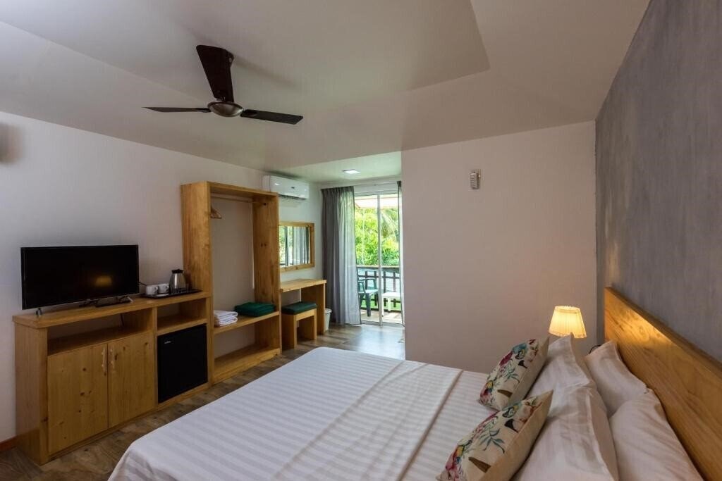 Фото Isla Dhiffushi Guest House гостиный двор