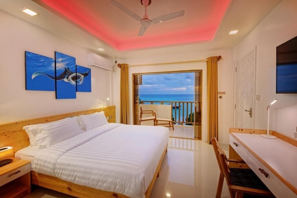 Фото Luau Beach Inn Maldives Guest House гостиный двор