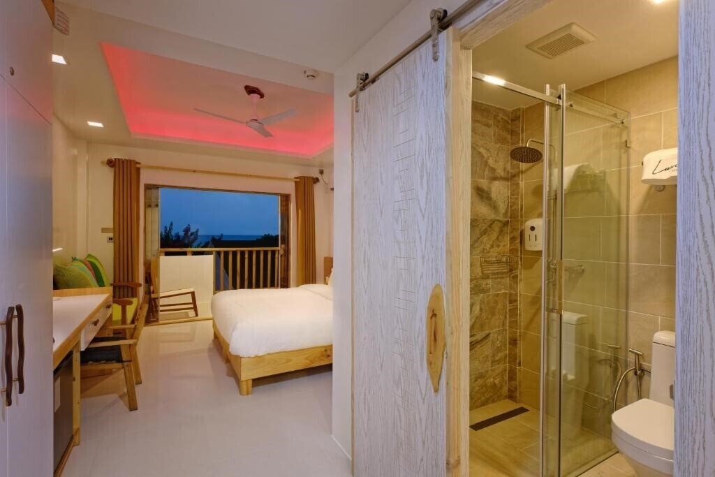 Фотография Luau Beach Inn Maldives Guest House гостиный двор