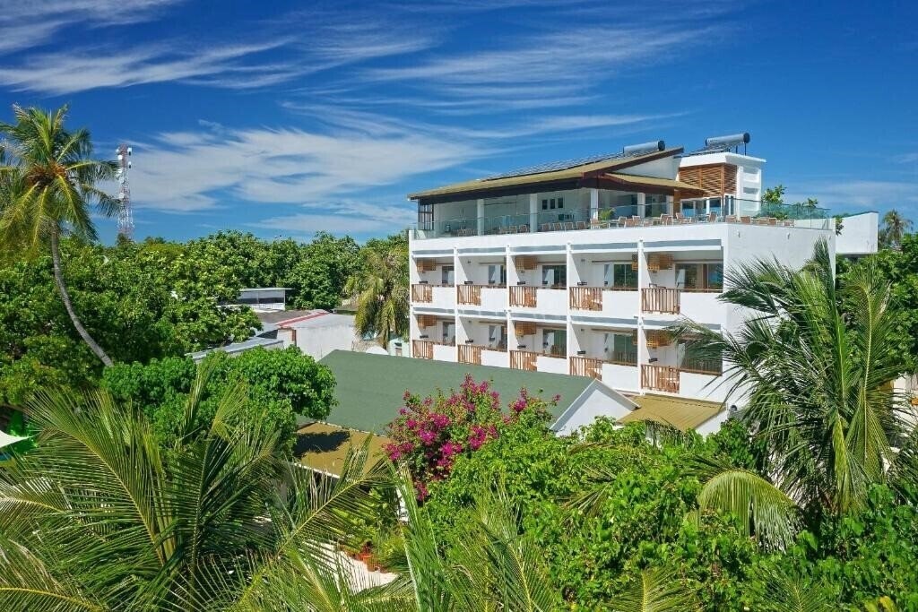 Картинка Luau Beach Inn Maldives Guest House гостиный двор