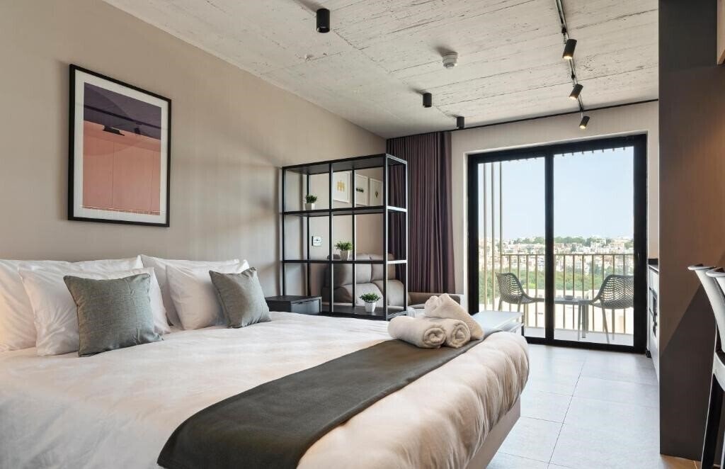 Фото Aparthotel Adagio Malta Central 4*