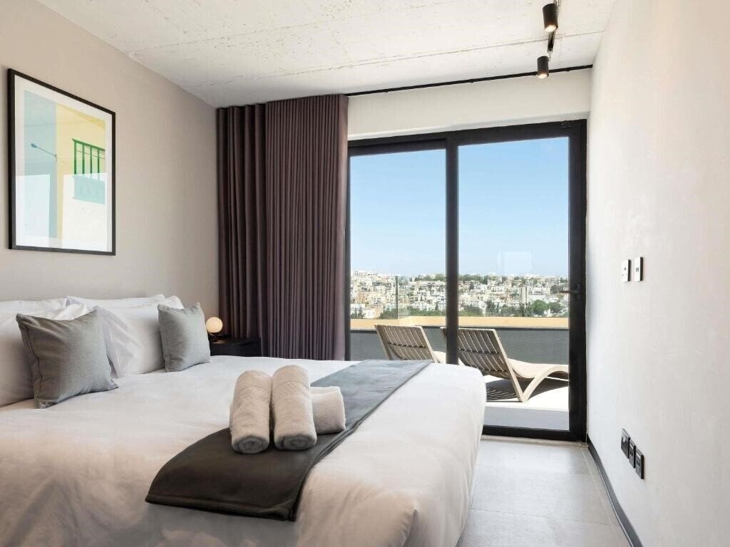 Фото Aparthotel Adagio Malta Central 4*