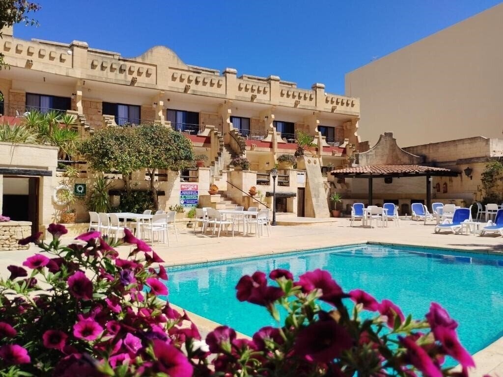 Отель Cornucopia Bungalows 4*