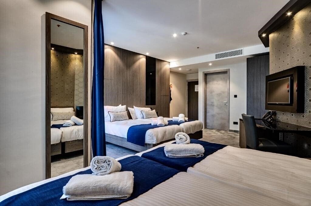 Фото The District Hotel Boutique 3*