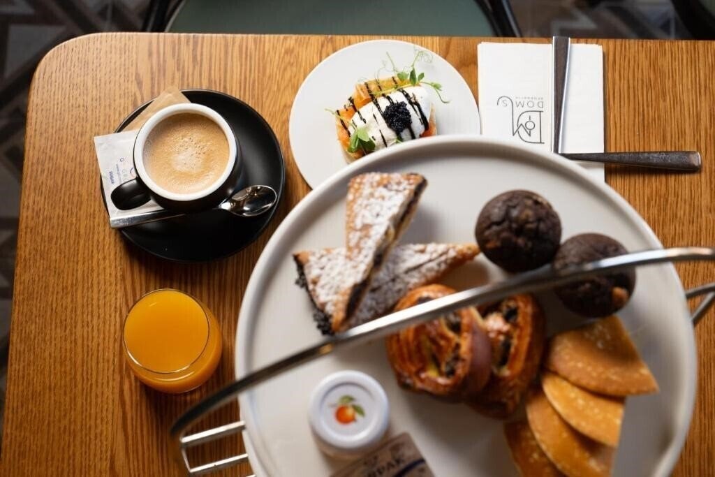 Фотографія DOMS Boutique Living 4*