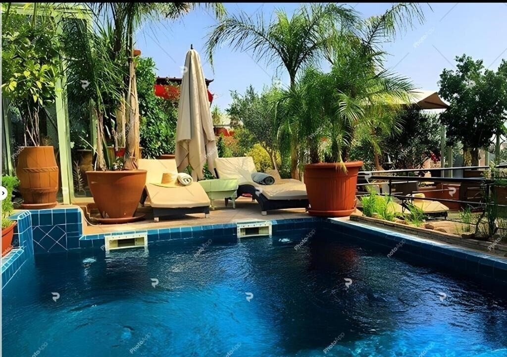 Отель Riad Moullaoud 5*