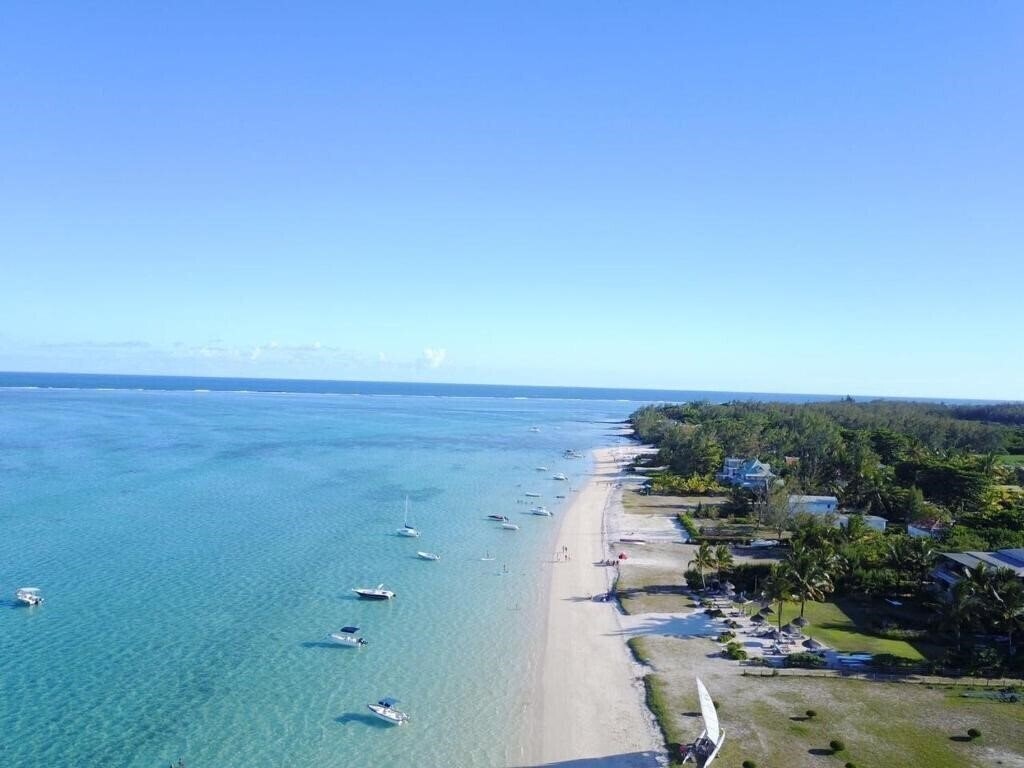Картинка Summer Breeze Beachfront Luxury Apartment Pointe d'Esny 4*