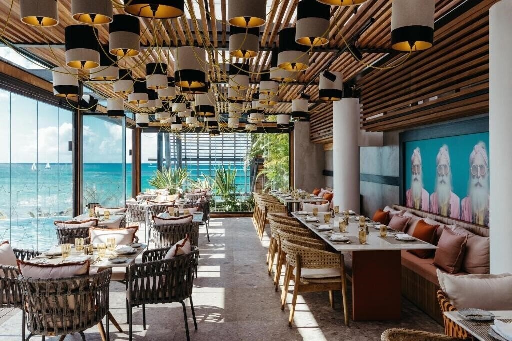 Фотографія LUX Grand Baie Resort & Residences 5*