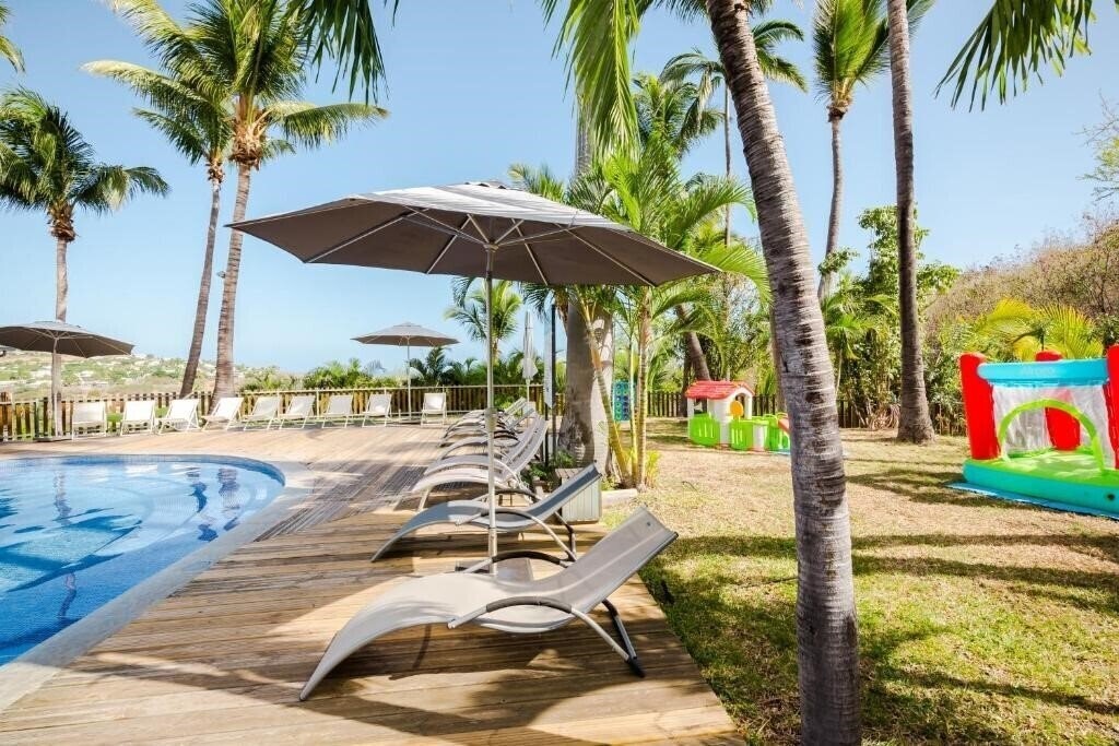 Зображення L Hotel Les Aigrettes 2*