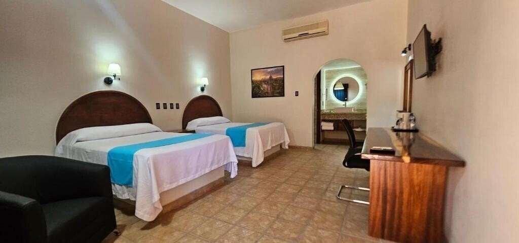 Фотография Hacienda Suites Loreto 3*