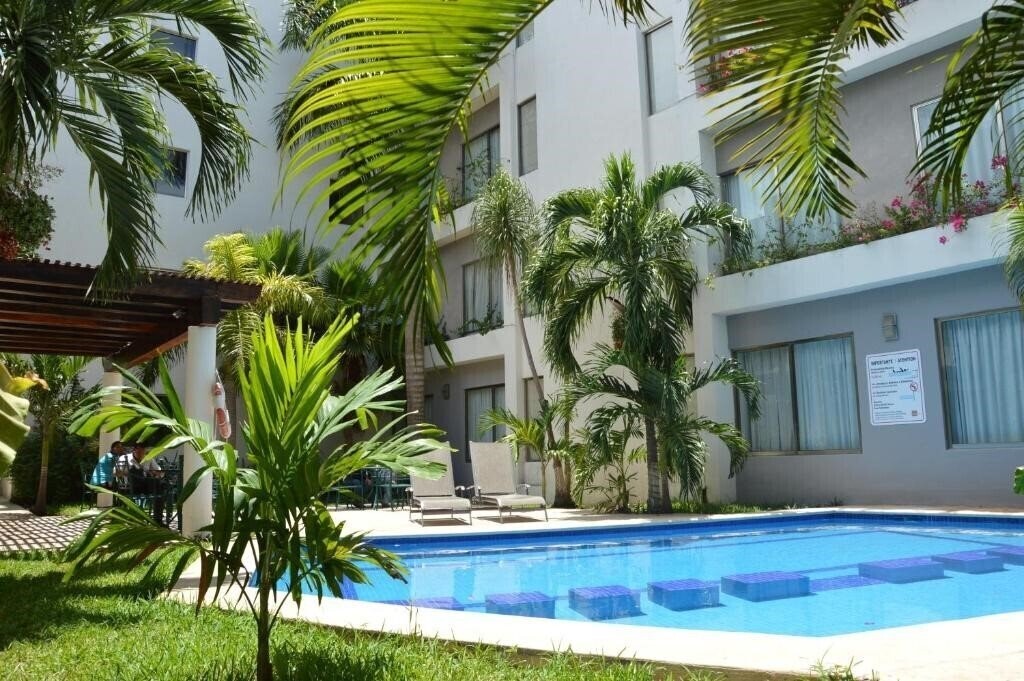 Отель Ambiance Suites Cancun 4*