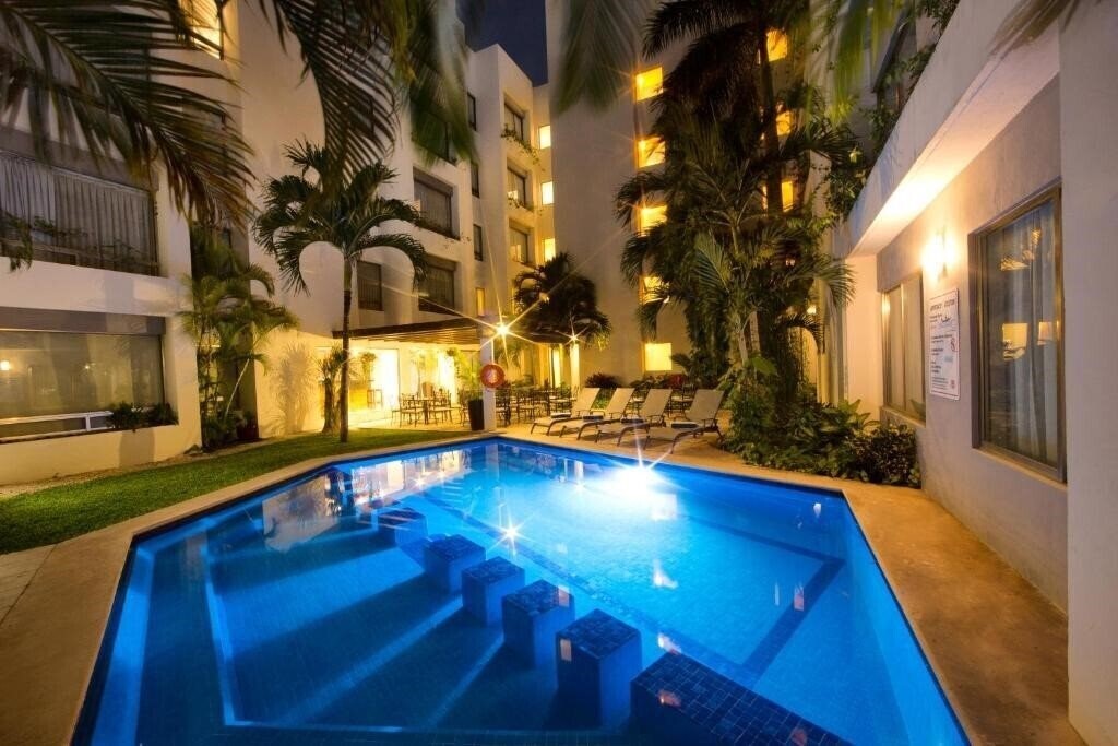 Фото Ambiance Suites Cancun 4*