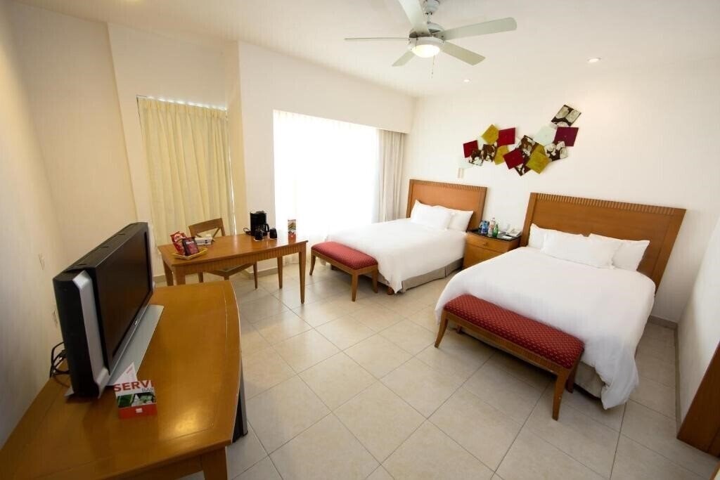 Фотография Ambiance Suites Cancun 4*