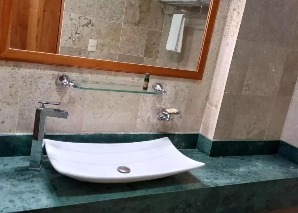 Фотографія Cancun International Suites 3*