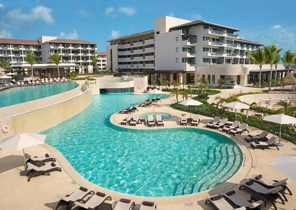 Фото Dreams Playa Mujeres Golf & SPA Resort 5*