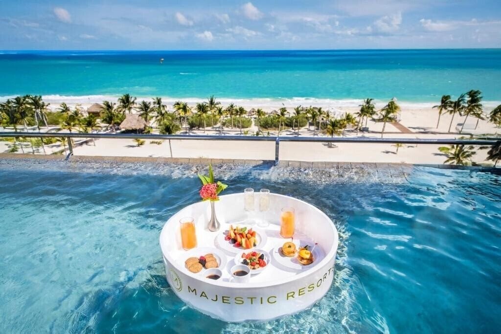 Фото Majestic Elegance Costa Mujeres 5*