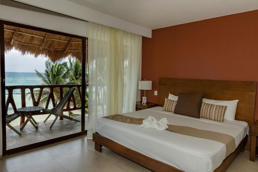 Фото Quinto Sole Boutique Hotel Mahahual 4*