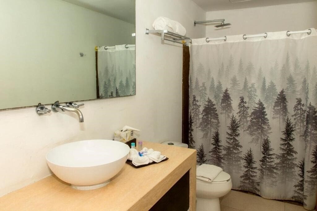 Фотографія Quinto Sole Boutique Hotel Mahahual 4*