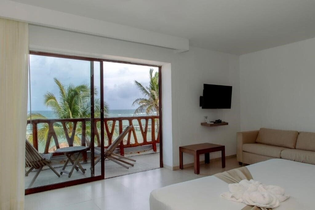 Картинка Quinto Sole Boutique Hotel Mahahual 4*