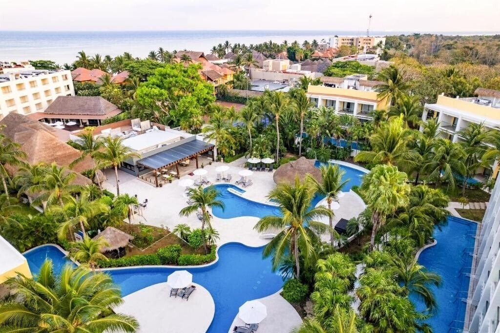 Фотографія Secrets Aura Cozumel 4*
