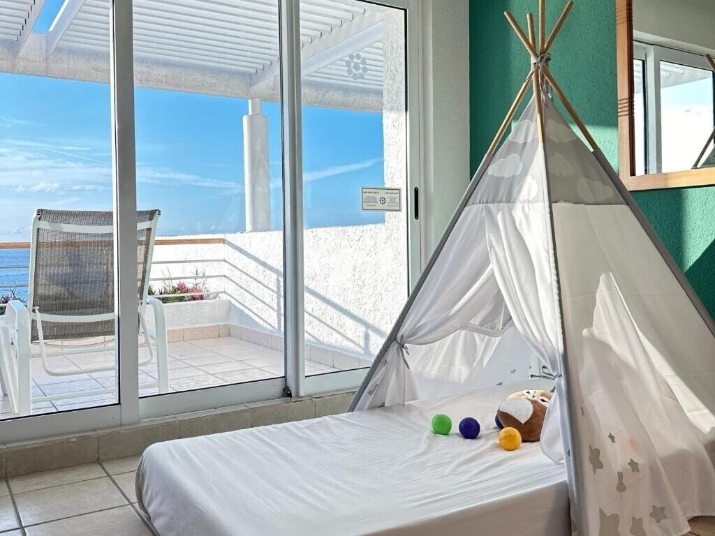 Фото Casa Mexicana Cozumel 4*