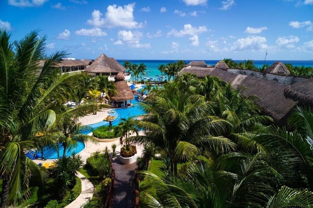 Фото The Reef Coco Beach Resort & SPA 4*