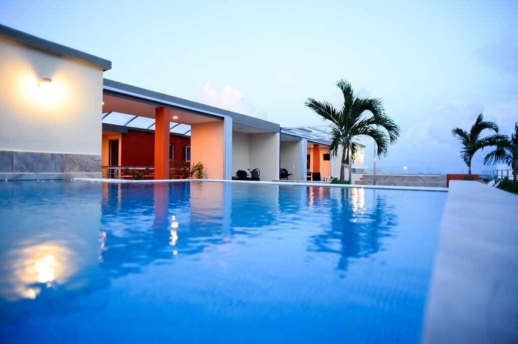 Отель Sunrise 42 Suites Hotel 3*