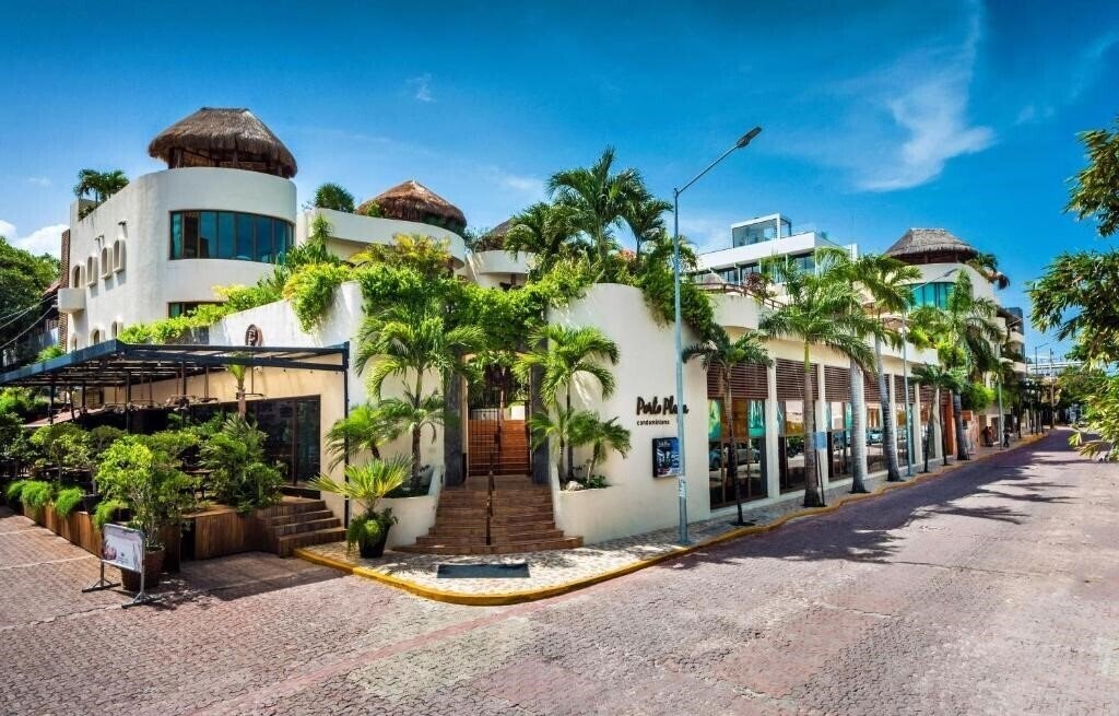 Фото Porto Playa Condo Hotel 4*