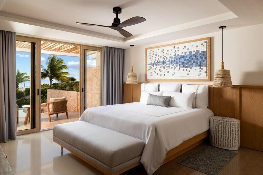 Фотографія Secrets Playa Mujeres Golf & SPA Resort 5*