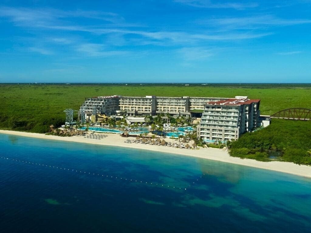 Отель Dreams Natura Resort & Spa 5*
