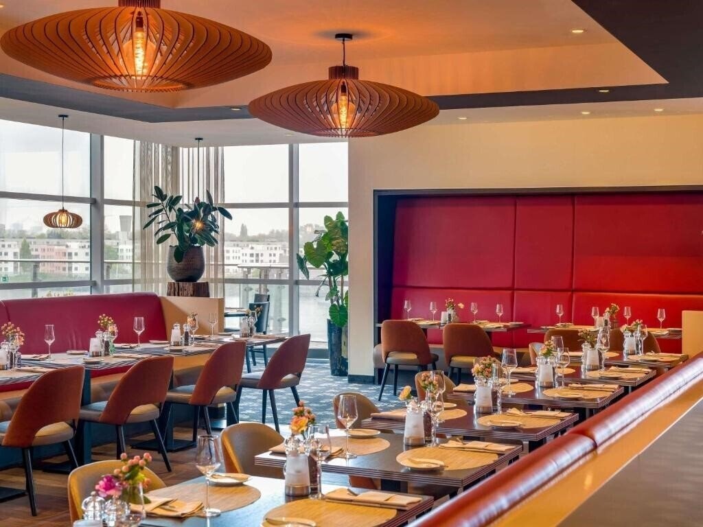 Фотографія Movenpick Hotel Amsterdam City Centre 4*