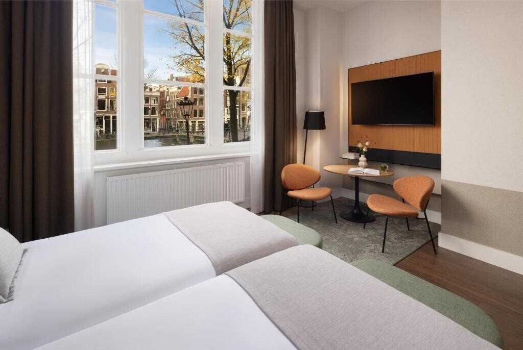 Фото NH Amsterdam Centre 4*