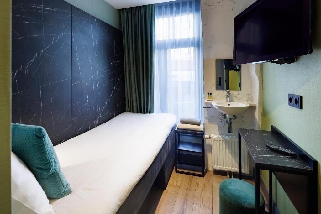 Фото Ciao Papa Hotel Amsterdam Central Station (Adults Only) 3*