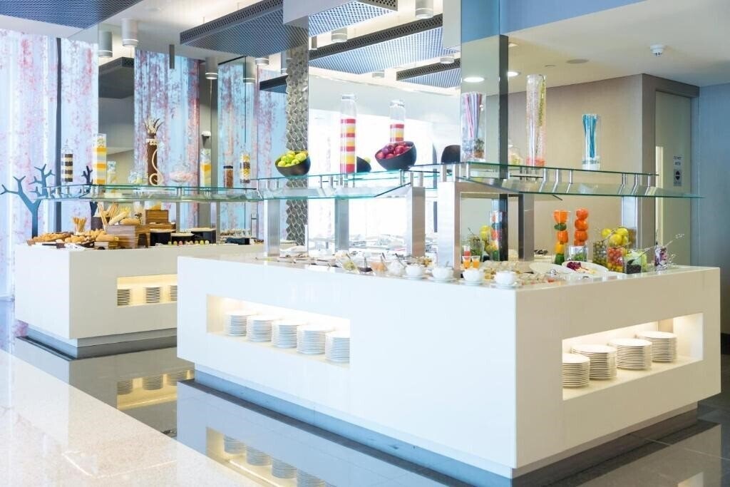 Изображение Adagio Abu Dhabi Al Bustan апартаменты