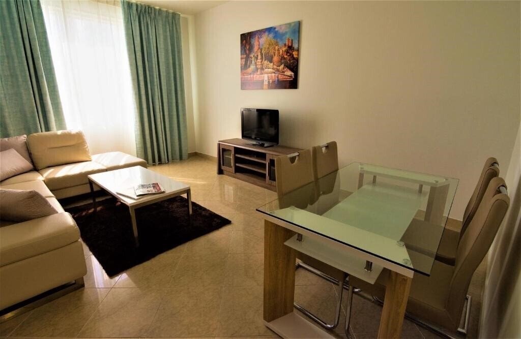 Отель Abu Dhabi Plaza Hotel Apartments апартаменты