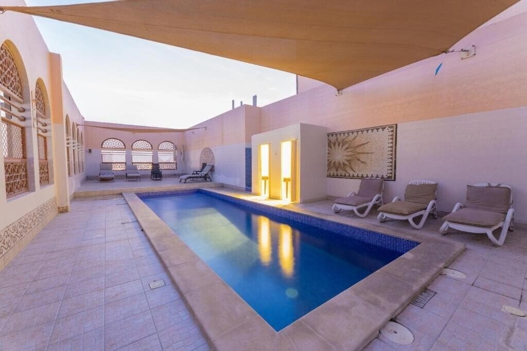 Фотография Ewan Hotel Apartments (ex. Ewan Ajman Suites Hotel, Ewa Ajman Suites, Ewan Suites Hotel) 4*